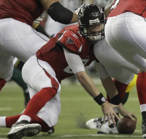 Matt Ryan - Doing the 2010 play offs against the Packers,Ryan got a bad snap and ended up banging head on lone of his lineman trying to hold on to the ball!