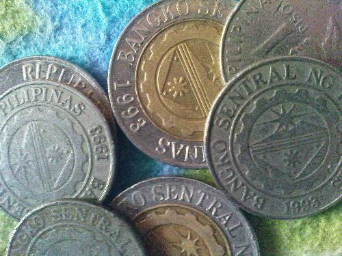 Philippine Money - One peso and 10 pesos coins.