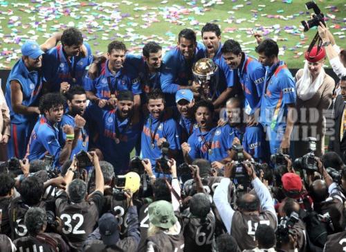 India With 2011 World Cup - After a dramatic final between India and Srilanka.India won the game and India won their second World Cup title.And it was only the third time in World Cup history a team chasing has won.