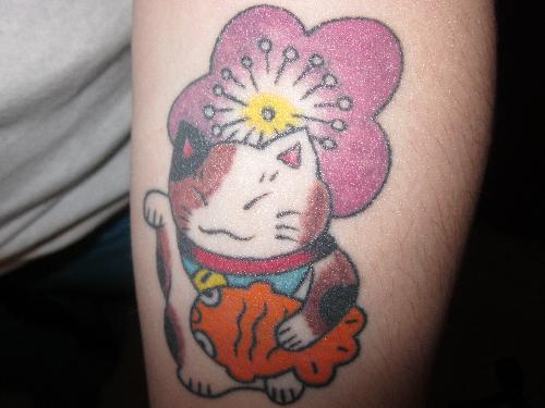 tattoo lucky cat - my newest tattoo. a lucky cat :) to give me luck throughout life.