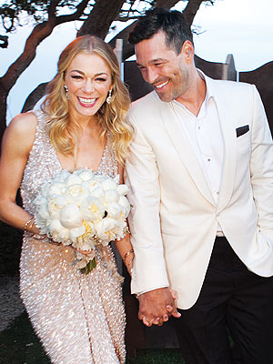 Leeann Rimes and her new husband - LeeAnn Rimes married her lover Eddie Cibrian. Rimes has said she doesn't feel guilty or ashamed for bresking up her marriage or Eddie's! I am sure this marriage will never last!