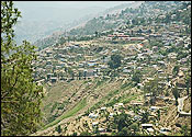Almora : Uttaranchal - This photo is of Almora, This charming hill resort was the flourishing capital of the chand dynasty. The region was earlier under the reigns of the katyuri king baichaldeo, who donated this area to Gujrathi brahmin Shri Chand Tiwari. In 1560 the capital of the chand destiny was shifted to Almora (From Champawat) by Kalyan chand. The beautiful town is set on a 6 kms long horse shaddle shaped ridge. It affords breadth taking views of the snowy summits of Himayalayas and is an excellent place for a peaceful holiday.