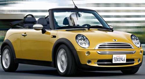 mini cooper- convertible - i would love to have one someday. i love the style of mini cooper's :)  i want mine in this color or in red :D