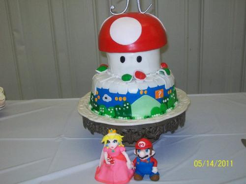 Wedding cake - My cousin Amanda(Rue) Atkins Hamilton and her husband Travis Hamilton's Mario wedding cake. Isn't it soooo cute?