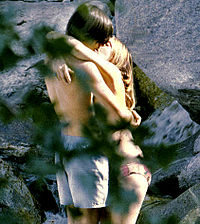 Kissing couple - A young coulpe kissing.