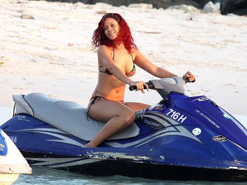 Rihanna - Rihanna on a jet ski in a tiny bikini!