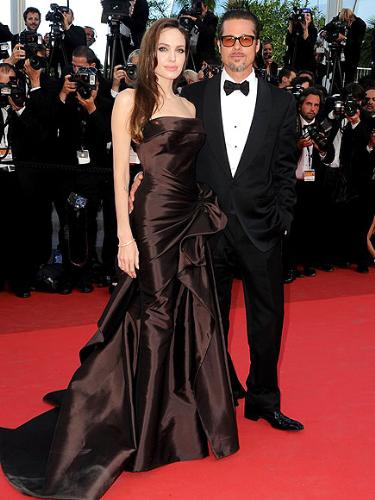 Angie and Brad - They are at the Cannes Film Festival. What a hot couple! Both look awesome!