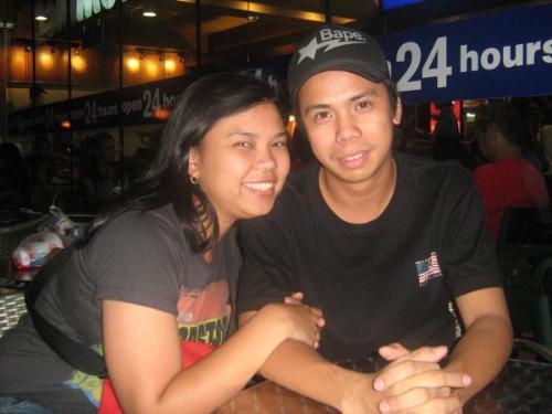 me n my honey - this pic was taken a year ago in MOA, me and my wife watch a concert called the 'FINAL SET' of ERASERHEADS. It's a great night watching my favorite band played their last concert.