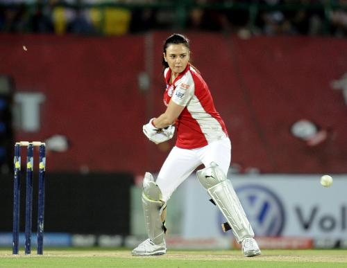 Zinta - Preity Zinta winds up for a big shot.