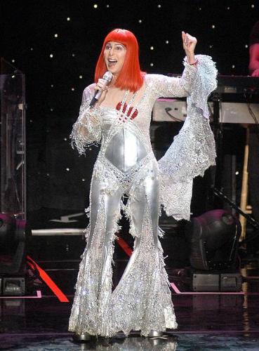 Cher - Cher preforming in a concert. I love her wigs but not the red ones!