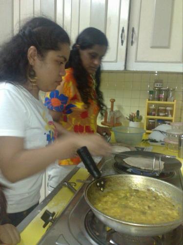 indian cooking class LOL -  trying to make chappati after I cooked the potato masala
taking it seriously hahaha 