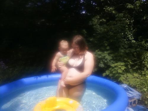 me an my daughter trinityrose - me her were swimming in our new pool
