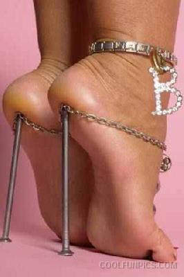 high heels - women wearing high heels, though not the most standard of high heels it does represent its discomfort properly