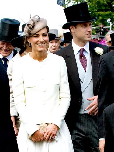 Kate and William - They were at the horse races last weekend. I like Kate's dress but didn't care for the hat! William looks ver dapper with the top hat!