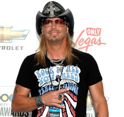 Bret Michaels - This is a normal out fit and look for him! Bret looks good this way! Don't trash him!