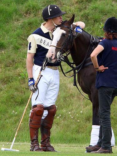 Quiet Moment - Prince William is shown here sharing a quiet moment with one of his polo ponies.