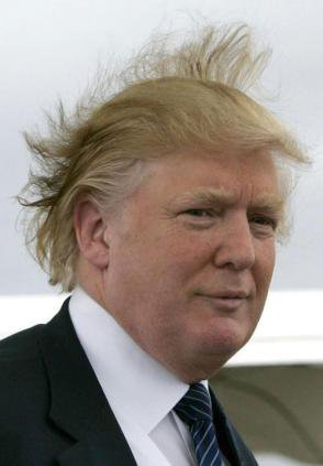 Donald Trump - With his hair blowing in the wind you wonder if he really isn't bald back their!