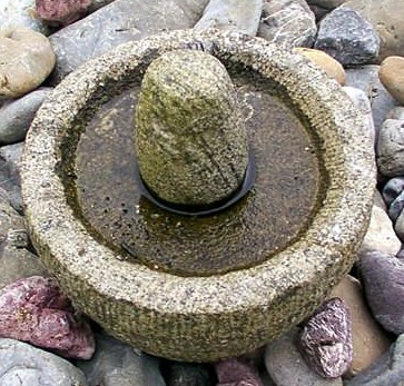 Primitive stone grinder - This is a must in every household here no matter how sophisticated a kitchen is with all the modern gadgets.