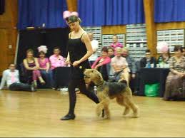 The lady who walks the dancing dog - Don't stare at the picture in vain. The girl in the picture is not inu. :))