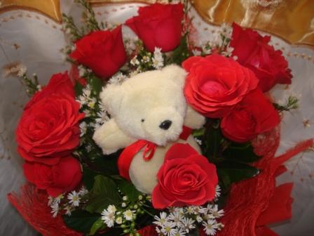 roses and teddy bear - valentines day 2011 - My boyfriend gave me this last valentines day.. so sweet. :)

--shot from my Sony cybershot camera