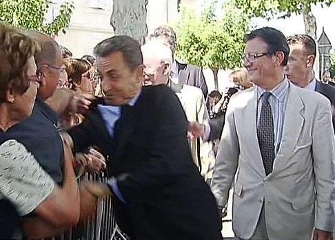 Sarkozy - He grabbed Sarkozy