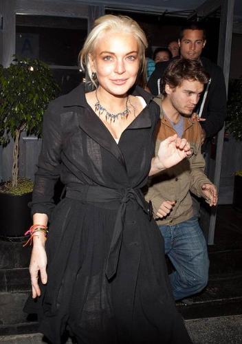 Lindsey Lohan - She is 25 years old. In this photo Lohan looks really old! yikes!