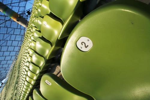 green seats - green seats on a stage.