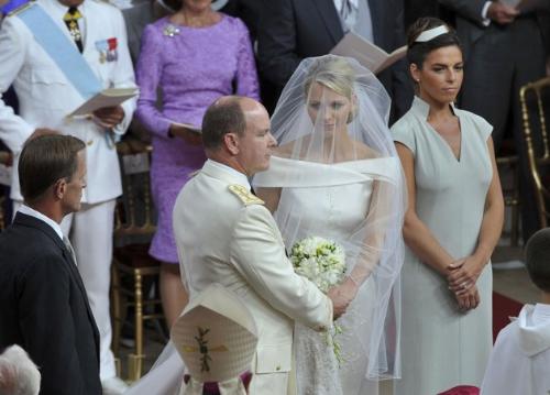 The ceremony - On saturday Prince Albert finally got married to Princess Charlene. On albert's right is his best man and on Charlene's left is her maid od honor.