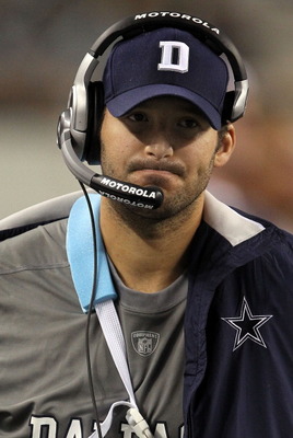 Tony Romo - Tony Romo walking the sidelines at a game. He had the broken collarbone then and Jon Kitna was his replacment.