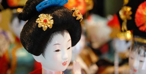 doll  - a geisha doll on parade.
