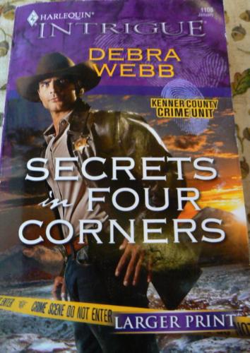 Secrets in four corners - A book called Secrets in four corners by Debra Webb.