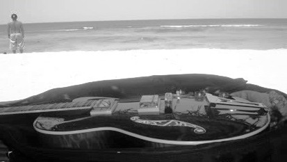 guitar - guitar left in the shore to gather dust and moisture.