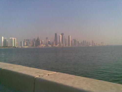 This is Qatar - This photo was taken in Qatar at the bay side name Corniche, as you can see all that building is the center of Doha Qatar. 