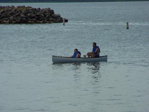 At the lake. - Hubby and I out on the lake in our canoe.