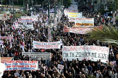 greece protesting government cuts - thousands having a angry fit over government not having infinite money to toss at them.