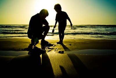 Father and Son - A wonderful picture of Father and Son with the sunset on the background.