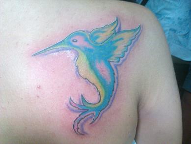 my first tattoo - A hummingbird tattooed on my right shoulder. It symbolizes a lot of things in my life. 