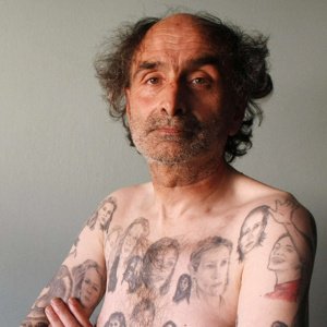 Tattoos - This man have over 80 tattoo's of Julia Roberts on his body! It is didturbing!
