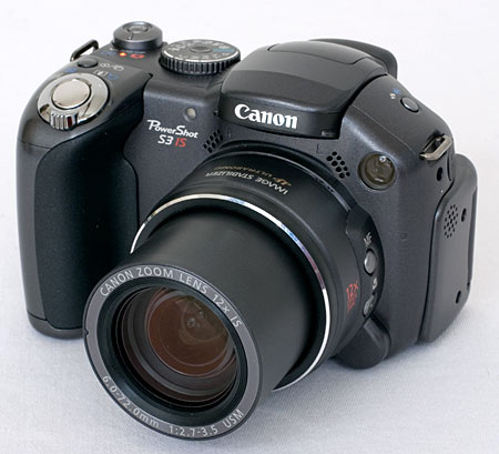 Canon Powershot - A black Canon Powershot digital camera.