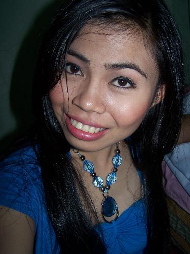 pretti jan - I love wearing blue because I felt so fresh with that color. It was taken after our pictorials for our graduation. My eyelids were so black because of the black eyeliner.
