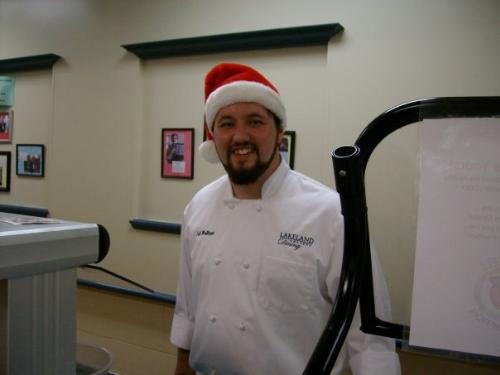 Jeff,the little brother - Jeff was doing a holiday cooking demotration last December and that is why he has a Santa hat on!