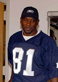 Tim Brown - Heisman Trophy winner and was in outstanding WR for the Oakland Raiders.