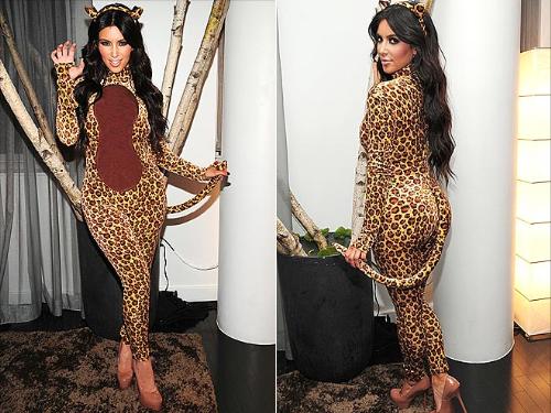Cat woman - Kim Kardashian dressed as a leopard for Halloween one year.
