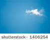 Sky - One single cloud in a blue sky