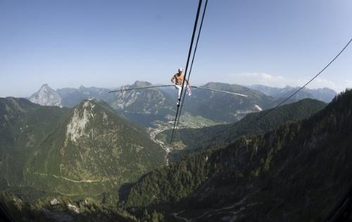 Tight rope walker - Tight rope walker Freddy Nock walking a cable car cable in Germany. He wants to walk on all the cable car cables in Germany and Austria to set a record.
