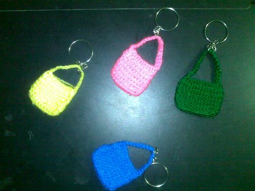 crocheting keychain - simple crochet work...actually I wanted to make a big bag but i was too lazy so I made smaller bag as key chain. Was too lazy to changing color but I will add accesories later