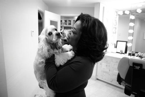 Oprah and friend - This oprah with her Cocker Spaniel. So cute!