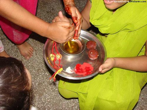 Aarti - Aarti is Hindu ritual in which light from wicks soaked in purified butter is offered to a person or an idol. it is said to have described from the Vedic concept of fire rituals.