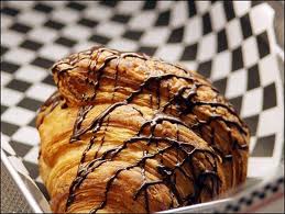 Croissant - Nothing beats a freshly baked croissant covered in sweet chocolate.