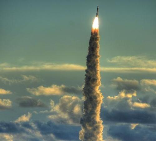 rocket - rocket - gases go hot and very fast on one direction, the rocket accelerating on opposite direction